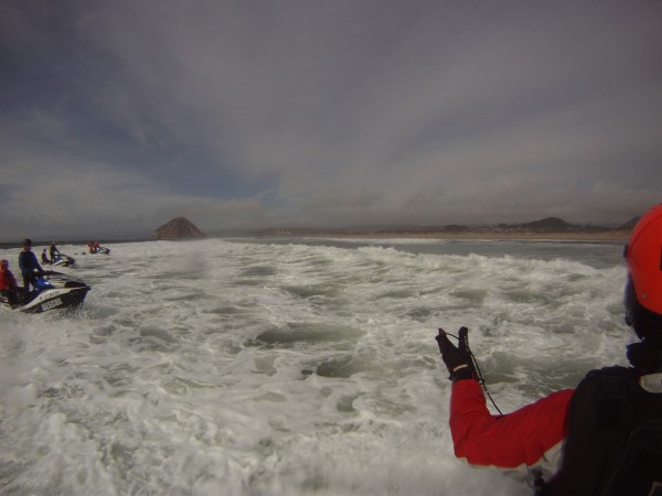 Instructor Shawn Alladio directs the echelon formation through the surfline.